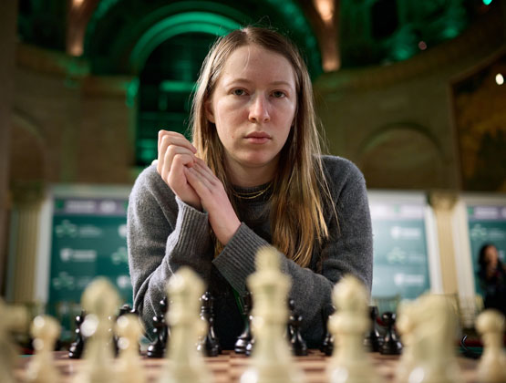 woman playing chess