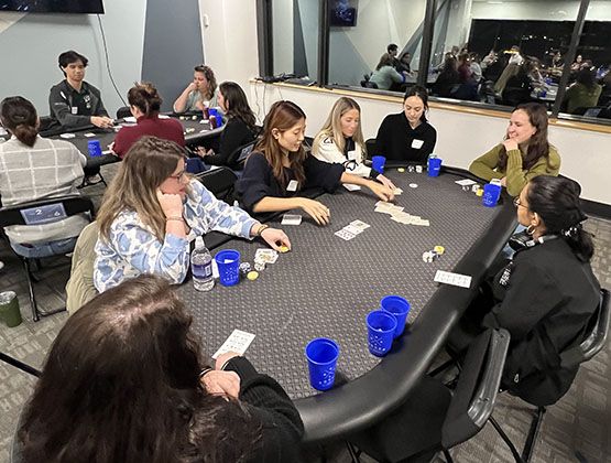 Women attending a poker class in preparation for the tournament